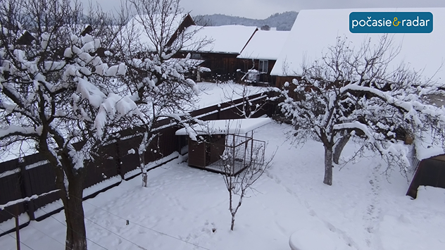 Zimná zasnežená krajina.