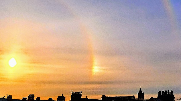 Sun dog over homes