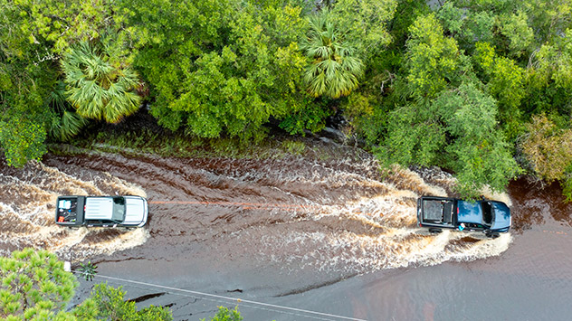 Überflutete Straße durch Tropensturm DEBBY