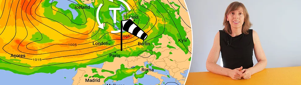 Das Bild zeigt eine Wettermoderatorin, die an einem Tisch sitzt. Links neben ihr ist eine Europakarte mit einer Wettervorhersage zu sehen. Darauf sind Regengebiete in Grün, Gelb und Orange sowie ein Tiefdruckgebiet über Nordeuropa eingezeichnet. Weiße Pfeile verdeutlichen die Drehbewegung des Tiefs, während ein Windsack über Norddeutschland auf kräftigen Wind hinweist.