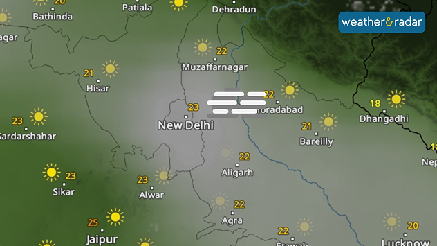 Weather forecast map of northern India showing fog over New Delhi and nearby areas, with sun icons elsewhere and temperature labels around cities such as Hisar, Agra, Jaipur, and Muzaffarnagar.
