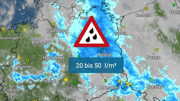 Wetterkarte von Nordostdeutschland mit Starkregenwarnung (2050 l/m²) rund um Berlin, dargestellt durch blaue Niederschlagsflächen und ein rotes Warnsymbol.
