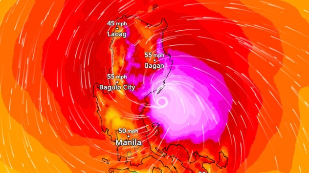 The weather map shows a tropical cyclone over the Philippines with its centre east of Manila.