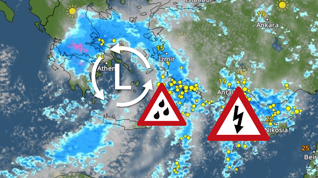 Weather map showing low pressure over the Aegean Sea, blue rain bands across Greece and Turkey, and heavy rain and thunderstorm warning symbols.