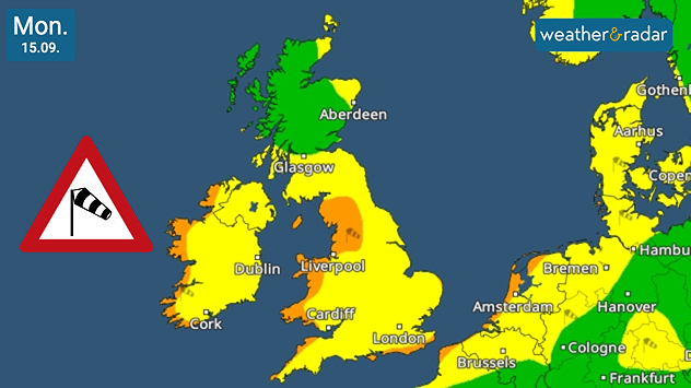 Weather warning map for Monday, 15 September, showing yellow and amber wind alerts. Amber warnings cover parts of north-west England around Liverpool, while yellow warnings extend across much of England, Wales, and eastern Ireland. Northern Scotland and parts of mainland Europe are shown in green with no warnings. A triangular wind hazard symbol is displayed on the left side of the image.
