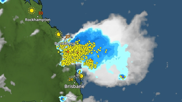Weather map showing a thunderstorm cell and lightning over the east coast of Queensland.