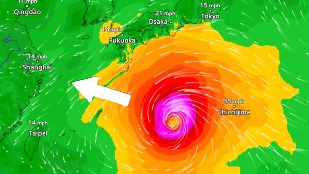 Weather map showing a typhoon south of Japan. The centre of the storm is over the Pacific and is moving westwards. The coloured wind fields indicate its high intensity.