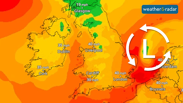 Map of the UK and nearby Europe showing wind speeds in mph with orange to red shading and a large rotating low-pressure symbol centred near the North Sea; highest speeds around London and Brussels.