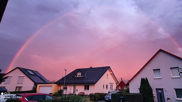 © Knut Regenbogen im purpur Licht der untergehenden Sonne