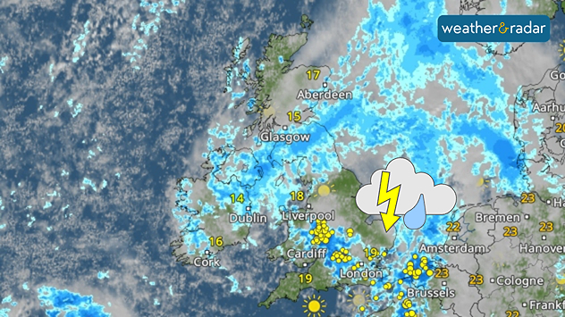 Weather map of the UK and nearby Europe showing widespread rain across much of Britain and Ireland, with heavier showers and thunderstorms marked over south-east England and northern France. Temperatures range from 14°C in Dublin to 19°C in London and Cardiff, with brighter conditions in the far south.