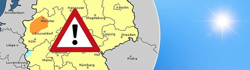 Deutschlandkarte mit Ozonbelastung: orange markiertes Gebiet in NRW um Münster, gelbe Flächen im Rest des Landes, rechts Sonne auf blauem Himmel, Warnsymbol in der Mitte. (c) Gergitek/shutterstock.com
