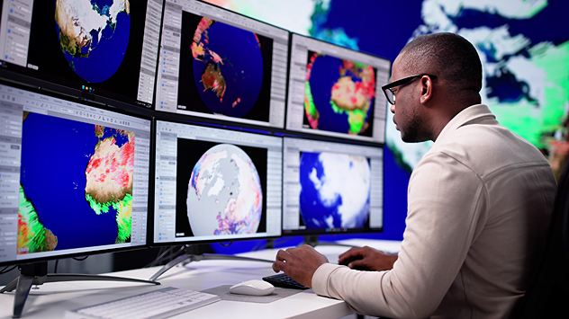Meteorologist analyses global weather data.
