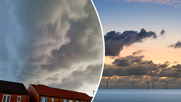The image is split into two scenes: on the left, dark grey storm clouds loom heavily over rooftops of brick houses, creating a dramatic sky; on the right, large clouds stretch across a calmer evening sky above the sea, with silhouettes of offshore wind turbines visible on the horizon.