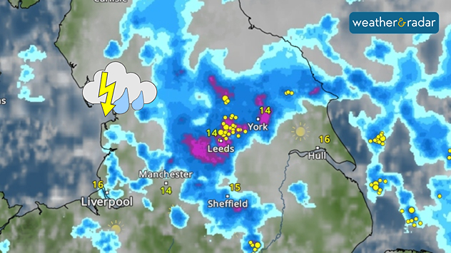 Weather radar map of northern England showing widespread rain. Dark blue and purple areas, especially around Leeds and York, indicate heavy rainfall. Yellow lightning strike markers are scattered across the region, with a thunderstorm icon near Liverpool. Temperatures range from 14°C to 16°C in cities including Manchester, Sheffield, York, and Hull.
