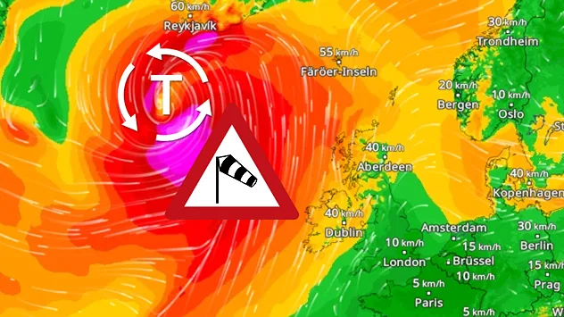 Das WindRadar zeigt ein kräftiges Orkantief südwestlich von Island. Rote und violette Farben markieren extreme Windgeschwindigkeiten. Pfeile zeigen die Drehrichtung, ein Windsack-Symbol warnt vor Sturm.