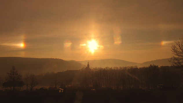 © Gloria Fritz Halos mit Nebensonne in der Thüringen Rhön Abendhimmel
