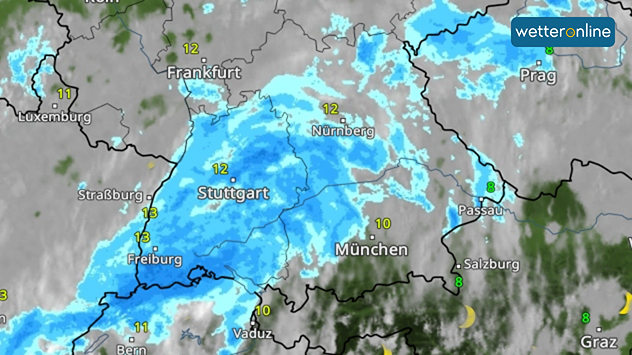 Wetterkarte zeigt ausgedehnten Regen über Süddeutschland mit Temperaturen um 10 bis 13 Grad.