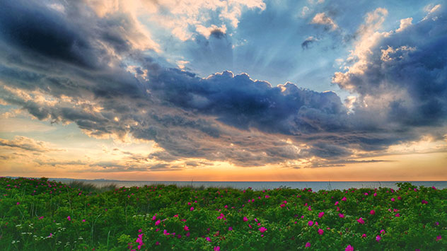 Die Sonne sorgt zusammen mit einer Haufenwolke für eine fantastische Lichtstimmung.