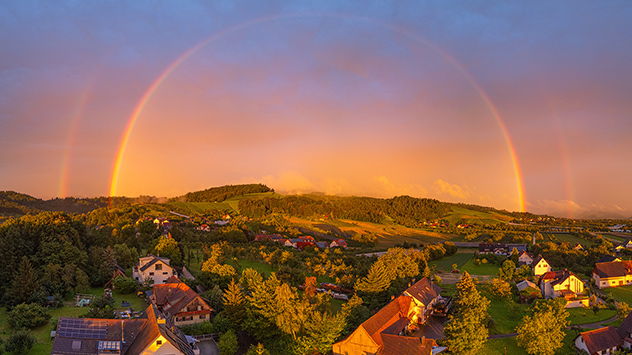 © Hubert Grimmig Doppelter Regenbogen im Sonnenuntergang bei Ulm