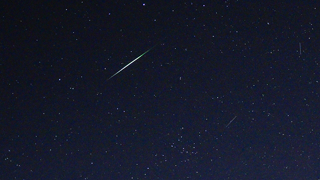 Shooting stars, part of the Geminid meteor shower.