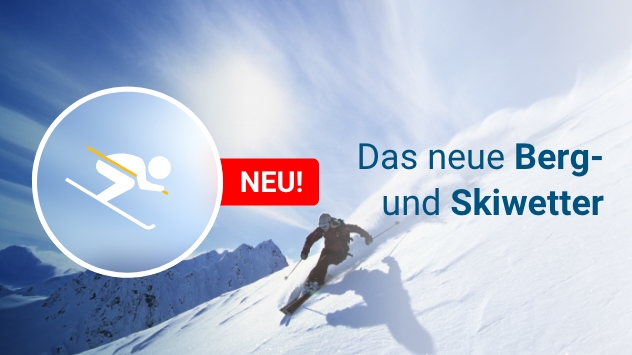 Ein Skifahrer auf einer Piste bei Sonnenschein und Schnee