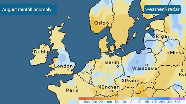 August rainfall anomaly map of Europe showing drier-than-average conditions in yellow and wetter areas in blue, including parts of the UK and central Europe.